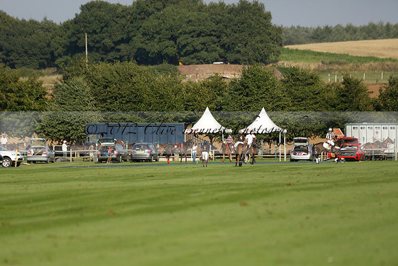 Pluma Negra (white) v Shoreline (black) in the Brecknock Cup Subsidiary final polo match played on Sunday 25 August 2013 at Cowdray Park Polo Club on Ambersham 1. 2013.10.12 www.polopictures.co.uk