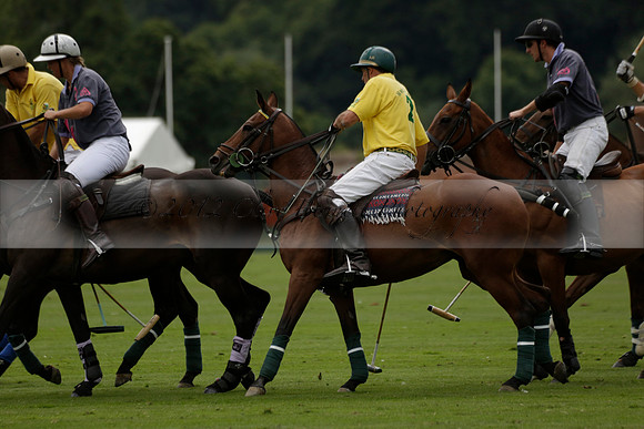 La Tremenda (lilac) v Maiz Dulce (yellow) in a Brecknock Cup polo match played on Lawns 1 at the Cowdray Park Polo Club on Tuesday 13 August 2013