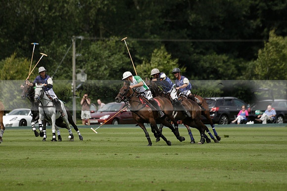 Burningfold (blue) v Wairakei Pastoral (green) in the Ruins Cup Final on Sunday 04 August 2013.