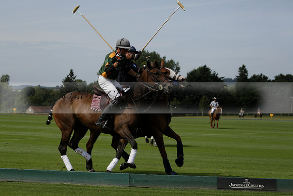 Maiz Dulce (green) v River (blue) in a Uber Polo Midsummer 12 goal polo match on Wednesday 21 August 2013 at Cowdray park Polo Club on Ambersham 2.  www.polopictures.co.uk