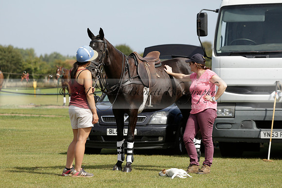 Maiz Dulce (green) v River (blue) in a Uber Polo Midsummer 12 goal polo match on Wednesday 21 August 2013 at Cowdray park Polo Club on Ambersham 2.  www.polopictures.co.uk