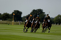Maiz Dulce (green) v River (blue) in a Uber Polo Midsummer 12 goal polo match on Wednesday 21 August 2013 at Cowdray park Polo Club on Ambersham 2.  www.polopictures.co.uk