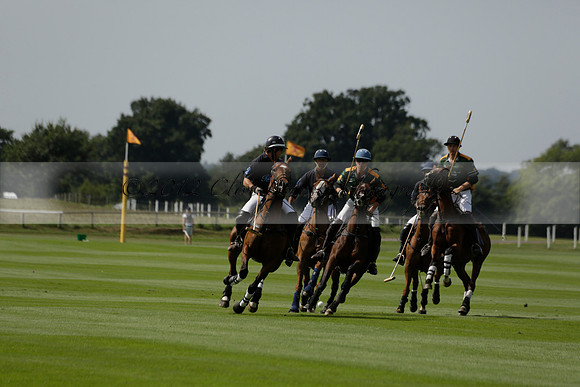 Maiz Dulce (green) v River (blue) in a Uber Polo Midsummer 12 goal polo match on Wednesday 21 August 2013 at Cowdray park Polo Club on Ambersham 2.  www.polopictures.co.uk