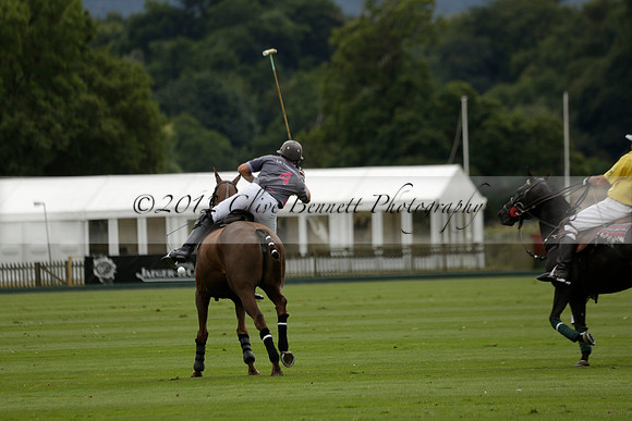 La Tremenda (lilac) v Maiz Dulce (yellow) in a Brecknock Cup polo match played on Lawns 1 at the Cowdray Park Polo Club on Tuesday 13 August 2013
