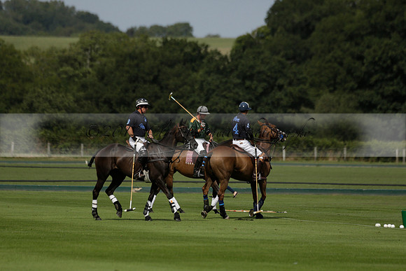 Maiz Dulce (green) v River (blue) in a Uber Polo Midsummer 12 goal polo match on Wednesday 21 August 2013 at Cowdray park Polo Club on Ambersham 2.  www.polopictures.co.uk