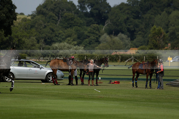 Maiz Dulce (green) v River (blue) in a Uber Polo Midsummer 12 goal polo match on Wednesday 21 August 2013 at Cowdray park Polo Club on Ambersham 2.  www.polopictures.co.uk