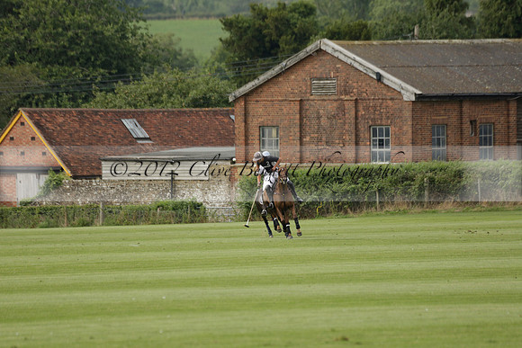 Beau Design v Boscom in an August Rother Cup 4 goal polo match at Cowdray Park Polo Club on Wednesday 07 August 2013