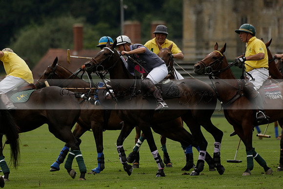 La Tremenda (lilac) v Maiz Dulce (yellow) in a Brecknock Cup polo match played on Lawns 1 at the Cowdray Park Polo Club on Tuesday 13 August 2013
