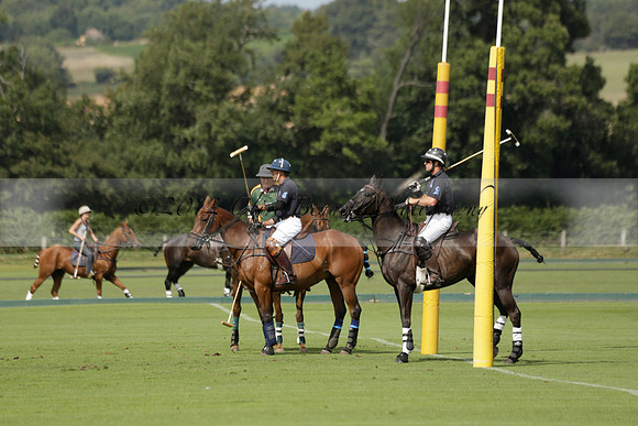 Maiz Dulce (green) v River (blue) in a Uber Polo Midsummer 12 goal polo match on Wednesday 21 August 2013 at Cowdray park Polo Club on Ambersham 2.  www.polopictures.co.uk