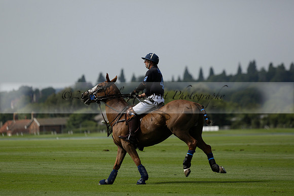 Maiz Dulce (green) v River (blue) in a Uber Polo Midsummer 12 goal polo match on Wednesday 21 August 2013 at Cowdray park Polo Club on Ambersham 2.  www.polopictures.co.uk