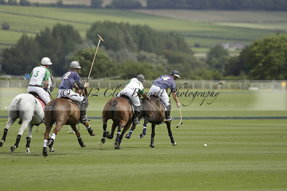Burningfold (blue) v Wairakei Pastoral (green) in the Ruins Cup Final on Sunday 04 August 2013.