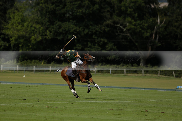 Maiz Dulce (green) v River (blue) in a Uber Polo Midsummer 12 goal polo match on Wednesday 21 August 2013 at Cowdray park Polo Club on Ambersham 2.  www.polopictures.co.uk