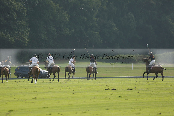 Pluma Negra (white) v Shoreline (black) in the Brecknock Cup Subsidiary final polo match played on Sunday 25 August 2013 at Cowdray Park Polo Club on Ambersham 1. 2013.10.12 www.polopictures.co.uk