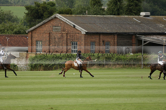Beau Design v Boscom in an August Rother Cup 4 goal polo match at Cowdray Park Polo Club on Wednesday 07 August 2013