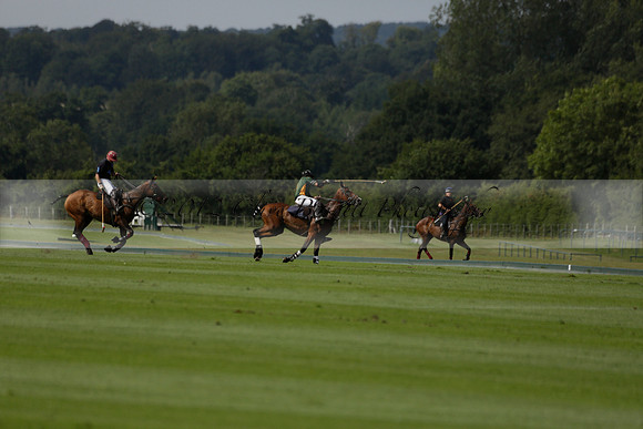 Maiz Dulce (green) v River (blue) in a Uber Polo Midsummer 12 goal polo match on Wednesday 21 August 2013 at Cowdray park Polo Club on Ambersham 2.  www.polopictures.co.uk