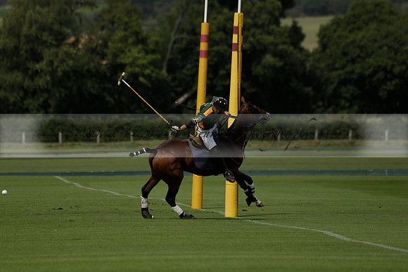 Maiz Dulce (green) v River (blue) in a Uber Polo Midsummer 12 goal polo match on Wednesday 21 August 2013 at Cowdray park Polo Club on Ambersham 2.  www.polopictures.co.uk