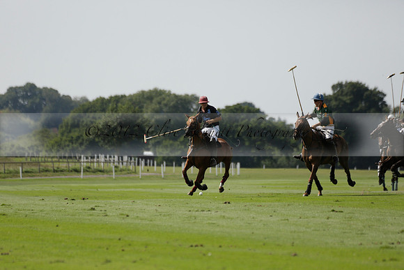 Maiz Dulce (green) v River (blue) in a Uber Polo Midsummer 12 goal polo match on Wednesday 21 August 2013 at Cowdray park Polo Club on Ambersham 2.  www.polopictures.co.uk