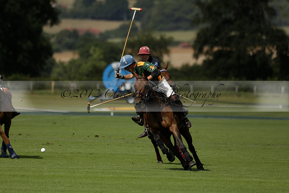 Maiz Dulce (green) v River (blue) in a Uber Polo Midsummer 12 goal polo match on Wednesday 21 August 2013 at Cowdray park Polo Club on Ambersham 2.  www.polopictures.co.uk