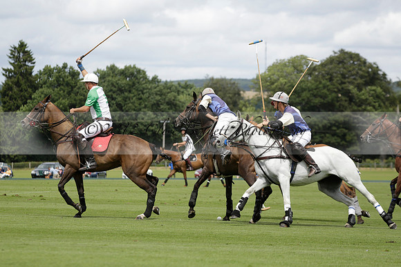 Burningfold (blue) v Wairakei Pastoral (green) in the Ruins Cup Final on Sunday 04 August 2013.