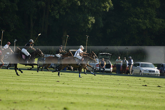 Pluma Negra (white) v Shoreline (black) in the Brecknock Cup Subsidiary final polo match played on Sunday 25 August 2013 at Cowdray Park Polo Club on Ambersham 1. 2013.10.12 www.polopictures.co.uk