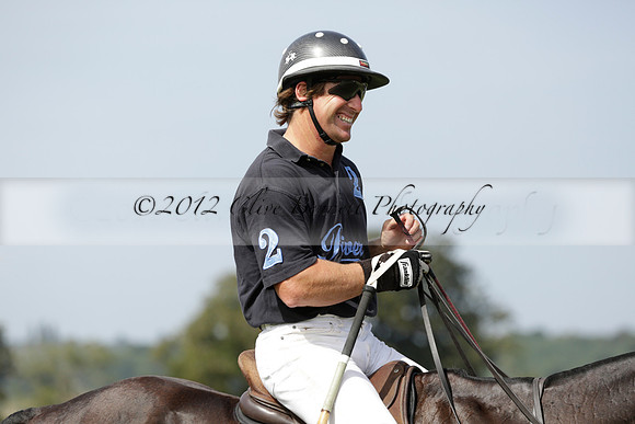 Maiz Dulce (green) v River (blue) in a Uber Polo Midsummer 12 goal polo match on Wednesday 21 August 2013 at Cowdray park Polo Club on Ambersham 2.  www.polopictures.co.uk