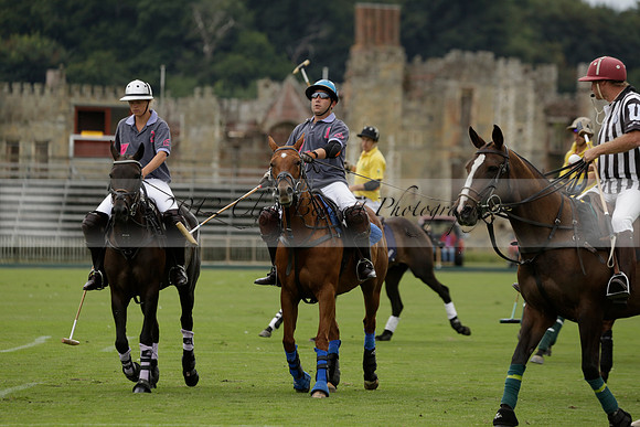 La Tremenda (lilac) v Maiz Dulce (yellow) in a Brecknock Cup polo match played on Lawns 1 at the Cowdray Park Polo Club on Tuesday 13 August 2013