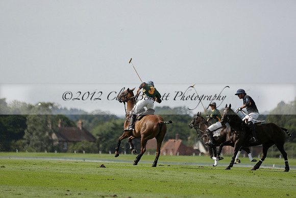 Maiz Dulce (green) v River (blue) in a Uber Polo Midsummer 12 goal polo match on Wednesday 21 August 2013 at Cowdray park Polo Club on Ambersham 2.  www.polopictures.co.uk