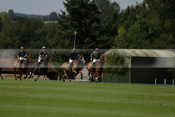 Maiz Dulce (green) v River (blue) in a Uber Polo Midsummer 12 goal polo match on Wednesday 21 August 2013 at Cowdray park Polo Club on Ambersham 2.  www.polopictures.co.uk