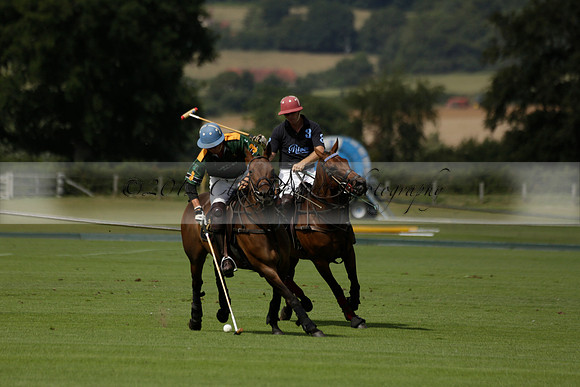 Maiz Dulce (green) v River (blue) in a Uber Polo Midsummer 12 goal polo match on Wednesday 21 August 2013 at Cowdray park Polo Club on Ambersham 2.  www.polopictures.co.uk