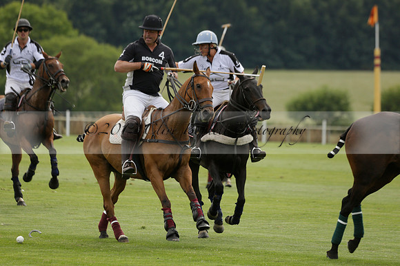 Beau Design v Boscom in an August Rother Cup 4 goal polo match at Cowdray Park Polo Club on Wednesday 07 August 2013