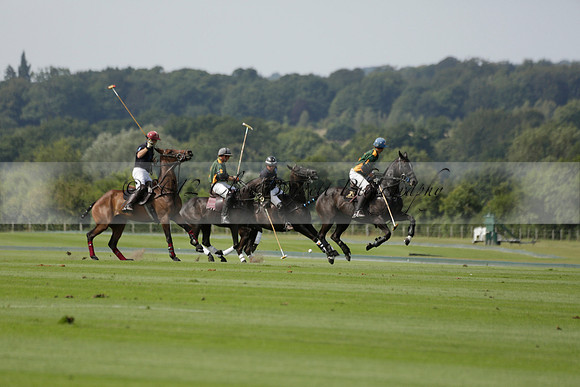 Maiz Dulce (green) v River (blue) in a Uber Polo Midsummer 12 goal polo match on Wednesday 21 August 2013 at Cowdray park Polo Club on Ambersham 2.  www.polopictures.co.uk