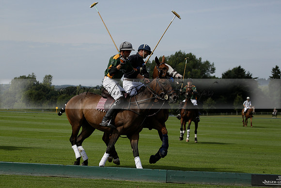 Maiz Dulce (green) v River (blue) in a Uber Polo Midsummer 12 goal polo match on Wednesday 21 August 2013 at Cowdray park Polo Club on Ambersham 2.  www.polopictures.co.uk