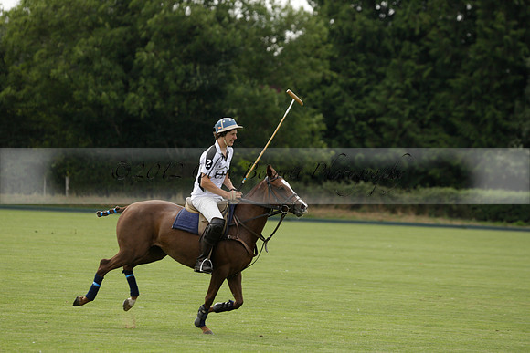 Beau Design v Boscom in an August Rother Cup 4 goal polo match at Cowdray Park Polo Club on Wednesday 07 August 2013