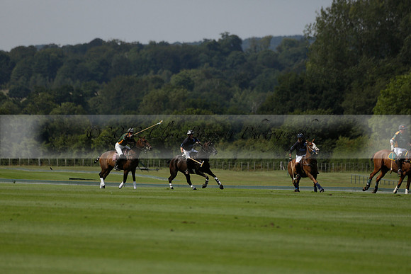 Maiz Dulce (green) v River (blue) in a Uber Polo Midsummer 12 goal polo match on Wednesday 21 August 2013 at Cowdray park Polo Club on Ambersham 2.  www.polopictures.co.uk