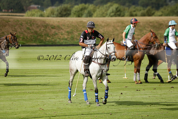 Jaeger Le Coultre (black)  v Wairakei Pastoral (white) in a Jaeger Le Coultre Holden White Cup polo match played on 29 July 2013 at Cowdray Park Polo Club on Brooksfieldwww.polopictures.co.uk