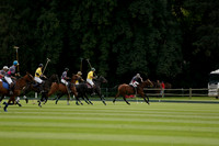 La Tremenda (lilac) v Maiz Dulce (yellow) in a Brecknock Cup polo match played on Lawns 1 at the Cowdray Park Polo Club on Tuesday 13 August 2013