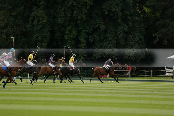 La Tremenda (lilac) v Maiz Dulce (yellow) in a Brecknock Cup polo match played on Lawns 1 at the Cowdray Park Polo Club on Tuesday 13 August 2013