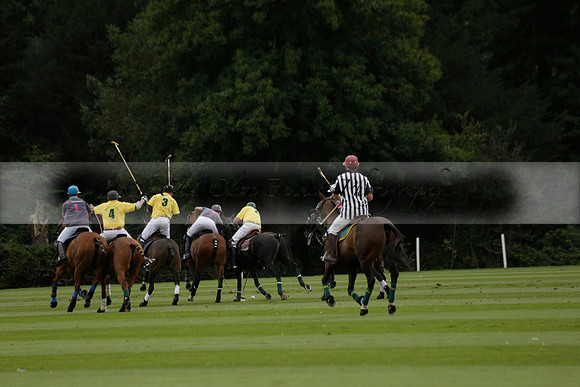 La Tremenda (lilac) v Maiz Dulce (yellow) in a Brecknock Cup polo match played on Lawns 1 at the Cowdray Park Polo Club on Tuesday 13 August 2013