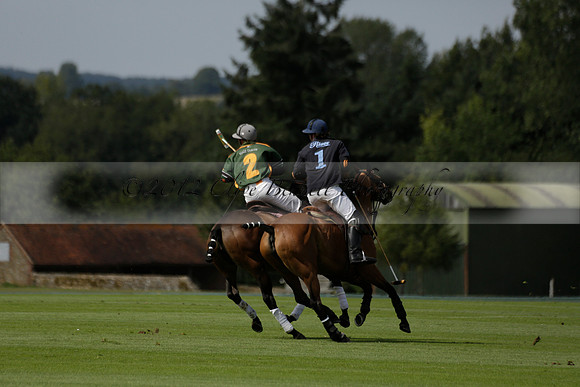 Maiz Dulce (green) v River (blue) in a Uber Polo Midsummer 12 goal polo match on Wednesday 21 August 2013 at Cowdray park Polo Club on Ambersham 2.  www.polopictures.co.uk