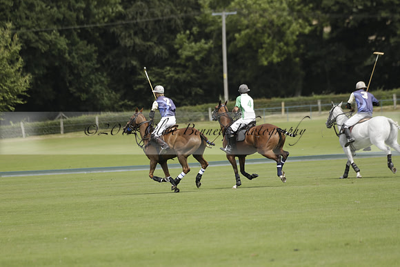Burningfold (blue) v Wairakei Pastoral (green) in the Ruins Cup Final on Sunday 04 August 2013.