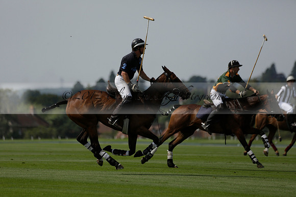 Maiz Dulce (green) v River (blue) in a Uber Polo Midsummer 12 goal polo match on Wednesday 21 August 2013 at Cowdray park Polo Club on Ambersham 2.  www.polopictures.co.uk