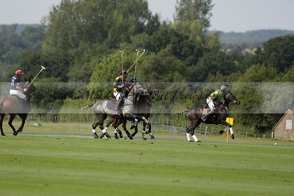 Maiz Dulce (green) v River (blue) in a Uber Polo Midsummer 12 goal polo match on Wednesday 21 August 2013 at Cowdray park Polo Club on Ambersham 2.  www.polopictures.co.uk