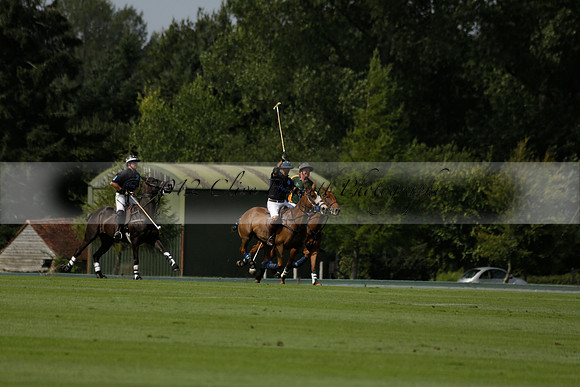 Maiz Dulce (green) v River (blue) in a Uber Polo Midsummer 12 goal polo match on Wednesday 21 August 2013 at Cowdray park Polo Club on Ambersham 2.  www.polopictures.co.uk