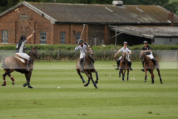 Beau Design v Boscom in an August Rother Cup 4 goal polo match at Cowdray Park Polo Club on Wednesday 07 August 2013