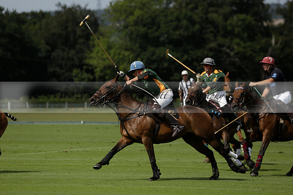 Maiz Dulce (green) v River (blue) in a Uber Polo Midsummer 12 goal polo match on Wednesday 21 August 2013 at Cowdray park Polo Club on Ambersham 2.  www.polopictures.co.uk