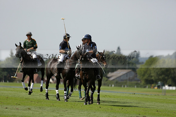 Maiz Dulce (green) v River (blue) in a Uber Polo Midsummer 12 goal polo match on Wednesday 21 August 2013 at Cowdray park Polo Club on Ambersham 2.  www.polopictures.co.uk