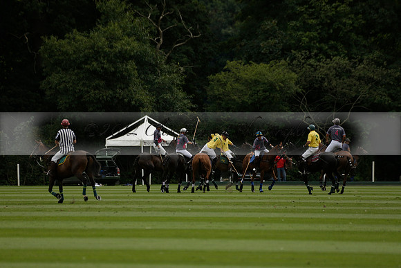 La Tremenda (lilac) v Maiz Dulce (yellow) in a Brecknock Cup polo match played on Lawns 1 at the Cowdray Park Polo Club on Tuesday 13 August 2013