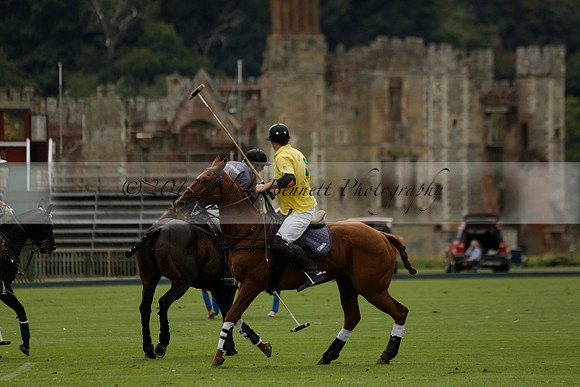 La Tremenda (lilac) v Maiz Dulce (yellow) in a Brecknock Cup polo match played on Lawns 1 at the Cowdray Park Polo Club on Tuesday 13 August 2013