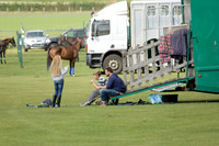 La Tremenda (mauve) v Maiz Dulce (green) in the Brecknock Cup  final polo match. Played at Cowdray Park Polo Club on Sunday 25 August 2013 on Ambersham 1. www.polopictures.co.uk