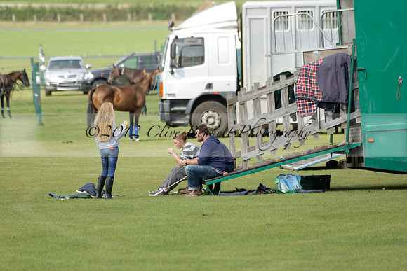 La Tremenda (mauve) v Maiz Dulce (green) in the Brecknock Cup  final polo match. Played at Cowdray Park Polo Club on Sunday 25 August 2013 on Ambersham 1. www.polopictures.co.uk